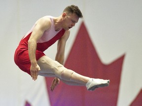 EDMONTON, AB.; JUNE 2, 2016 -- Jason Burnett of Team Ontario on the trampoline during the National Gymnastics Championship competition at the UofA in Edmonton June 2, 2016.  (Dan Riedlhuber/Postmedia News)  For Jason Hills (Postmedia News) NATIONAL GYMNASTICS CHAMPIONSHIP ORG XMIT: NationalGymnasticsChampionship01