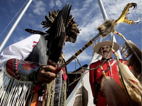 Dancer Darren Morin chats with RCMP Const. Phil Dahdona during the grand opening of the new Enoch RCMP Detachment at the Enoch Cree Nation,