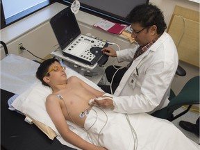 Sonographer Samad Khan examines Felipe Esis-Castro, 13. The pediatric cardiac clinic at the Stollery Children's Hospital in Edmonton unveiled its new portable cardiovascular ultrasound system on Monday, June 20, 2016.