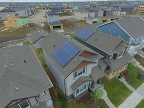Homes with solar panels on the roof.