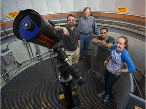 University of Alberta physicists, right to left, Bailey Tetarenko, Arash Bahramian, Craig Heinke, Gregory Sivakoff and­ Robin Arnason, not pictured, who is now at Western University, led an international group of collaborators in the discovery of a black hole that suggests there may be vast numbers of black holes in our galaxy that have gone unnoticed until now.