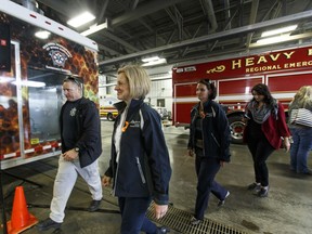 Premier Rachel Notley leaves a press conference at Fire Hall 5 in Fort McMurray, Alta., on Wednesday June 1, 2016. Residents began a phased reentry to communities around Fort McMurray on June 1.