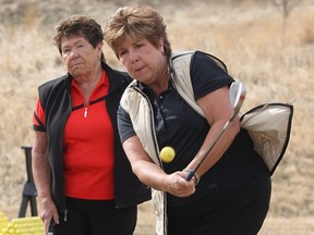 Dianne Hutton, left, and Kristy Hutton own a company called Golfaround that offers golf programs for women.