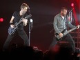 Nickelback lead singer Chad Kroeger, left, played alongside his brother Mike Kroeger and the other band members in Calgary on  March 12, 2015.
