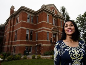 Salima Ebrahim, chair of the Anthology club, poses at the Strathcona branch of the Edmonton Public Library.