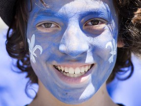 A painted face at the St-Jean-Baptiste Day parade in Montreal in June 2015. A dance party in Morinville, Alta., to celebrate the annual holiday attracted just two people.