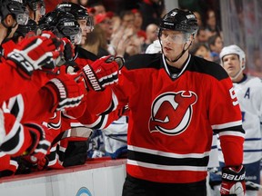 NEWARK, NJ - JANUARY 28: Adam Larsson #5 of the New Jersey Devils celebrates his third period game tying goal against the Toronto Maple Leafs at the Prudential Center on January 28, 2015 in Newark, New Jersey. The Devils defeated the Maple Leafs 2-1 in the shootout.