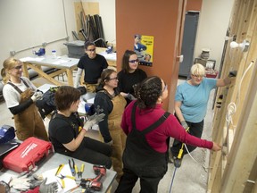 Women get hands-on training in the trades in a 2012 file photo at the Women Building Futures Suncor Energy Training Centre in Edmonton.