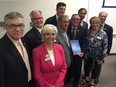 Nine Edmonton Metro Region mayors at the launch of the report: Be ready, or be left behind.  Backrow left to right: St. Albert mayor Nolan Crouse, Spruce Grove Mayor Stuart Houston, Edmonton Mayor Don Iveson, Parkland County Mayor Rod Shaigec, and Leduc County Mayor John Whaley. Front row left to right: Fort Saskatchewan Mayor Gale Katchur, Sturgeon County Mayor Tom Flynn, City of Leduc Mayor Greg Krischke, and Strathcona County Mayor Roxanne Carr.