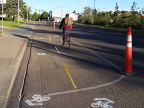City crews washed these bike lanes off the road quickly after someone drew them on Saskatchewan Drive Wednesday night.
