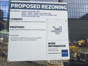 A sign advertises the Katz Group's original rezoning application for a gravel parking lot.