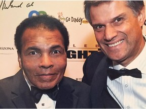 Edmonton clothier Sam Abouhassan and Muhammad Ali at Ali's Fight Night in Scottsdale about five years ago. The boxer's Fight Nights for 22 years benefitted his Parkinson's Centre and other charities.