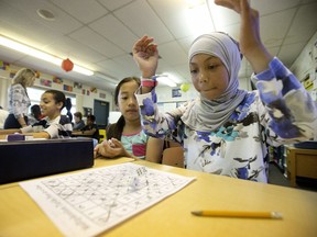 Skurta Imeri, 11, plays a math game in her Grade 5/6 split class at Evansdale school.