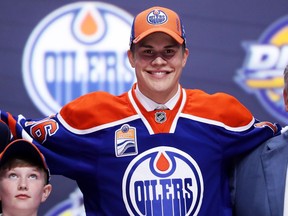 BUFFALO, NY - JUNE 24:  4. Jesse Puljujarvi celebrates after being selected fourth overall by the Edmonton Oilers during round one of the 2016 NHL Draft on June 24, 2016 in Buffalo, New York.