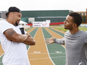 Sprinters Wallace Spearmon (left) and Andre De Grasse joke around during a press conference for the TrackTown Classic slated for July 15, at Foote Field in Edmonton, on Wednesday, July 13, 2016. Ian Kucerak / Postmedia (For Edmonton Journal story by Rob Tychkowski)