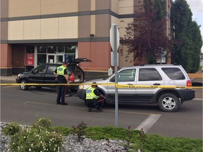 A 50-year old woman has died after being struck by an SUV in a parking lot at 137 Avenue and 135 Street in north Edmonton on Saturday, July 2, 2016. AINSLIE CRUICKSHANK / Postmedia Network