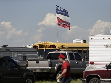 A Trump and Rebel flag are seen during Big Valley Jamboree 2016 in Camrose, Alberta on Friday, July 29, 2016.