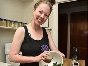Alexis Hillyard shows off her kale moustache after making a kale and strawberry salad for Stump Kitchen, her YouTube video series.
