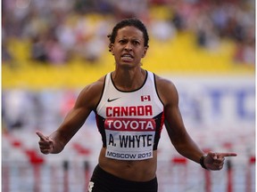 Canada's Angela Whyte competes during the women's 100 metres hurdles semi-final at the 2013 IAAF World Championships at the Luzhniki stadium in Moscow on August 17, 2013.