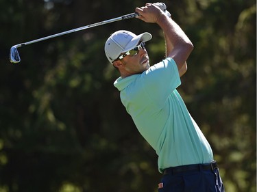 Brock Mackenzie tees off on the 4th hole during Round 2 of the Syncrude Oil Country Championship at the Glendale Golf & Country Club in Edmonton on July 29, 2016.