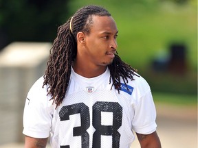 Robert Lester #38 of the Carolina Panthers walks toward the team's practice facility during the Panthers Rookie Camp on May 11, 2013 in Charlotte, North Carolina.  Lance King/Getty Images/AFP