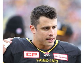 Hamilton Tiger-Cats quarterback Zach Collaros gets a pat on the shoulder from a teammate after sustaining a season-ending knee injury to against the Edmonton Eskimos last season.