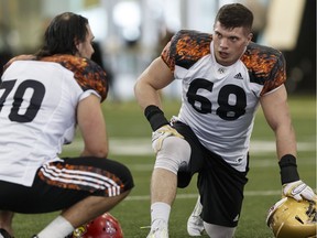 D.J. Lalama, right, seen here at the CFL Regional Combine in March, was released by the Edmonton Eskimos on Sunday, July 10, 2016.