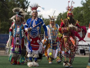 Dancers takes part in a traditional powwow at K-Days, which is hosting members from First Nation communities within Treaty Six and across Canada.
