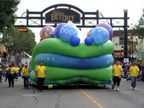 The City of Edmonton Float takes part during the Beverly Centennial Parade in Edmonton on Saturday, Aug. 23, 2014.