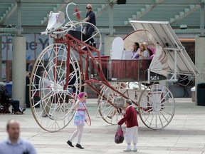 In September 2014, the Edmonton Arts Council sponsored the public art display of "Daisy" — a giant, solar-powered trike — in Churchill Square. Sam Carter of Vancouver's eatART was on hand to give rides.