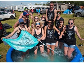 Big Valley Jamboree fans kept cool in a pool in 2015. The event returns this week to Camrose.