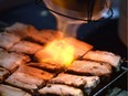 A pork dish sizzles in this photo from the 2015 Gold Medal Plates in Edmonton.