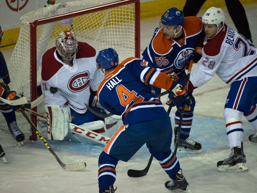 Taylor Hall gets s hot on goalie Carey Price as the Edmonton Oilers play the Montreal Canadiens at Rexall Place in Edmonton, October 29, 2015.