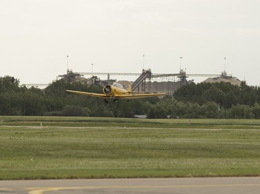 Yellow Thunder pilot David Watson lands his Harvard as Edmonton Journal reporter Juris Graney rides along at Villeneuve Airport ahead of the Edmonton Air Show in Sturgeon County, on Thursday, July 21, 2016.