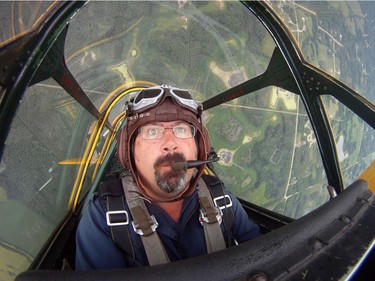 Yellow Thunder pilot David Watson in his Harvard airplane from Villeneuve Airport ahead of the Edmonton Air Show in Sturgeon County, on Thursday, July 21, 2016.