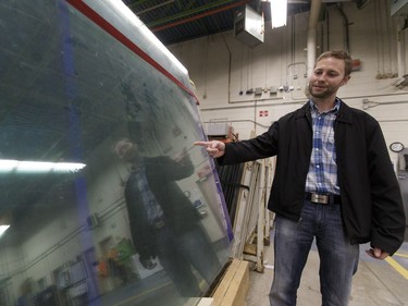 Trevor Dennehy, senior supervisor of Transit Facilities Maintenance with Edmonton Transit System, explains the process surrounding the replacement and repair of glass panels in bus stops at the ETS Davies workshop in Edmonton, on Wednesday, July 20, 2016.