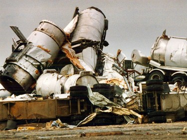 Vehicles and equipment is piled-up on refinery row off of Baseline Rd., after a massive tornado hit Edmonton.