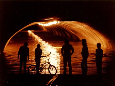 Edmonton's infamous "Rat Hole" at 109 St. and 104 Ave., is seen flooded after dark. A massive tornado hit Edmonton on Friday July 31, 1987.