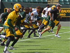 Even the Eskimos head coach Jason Maas was running the length of the field a couple times with players during practice at Commonwealth Stadium Edmonton, Monday, July 25, 2016. Ed Kaiser/Postmedia (Standalone Photo)