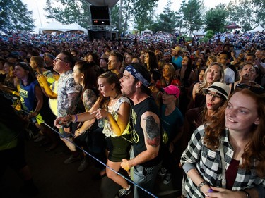 Fans get into it as the Strumbellas perform during Interstellar Rodeo at Hawrelak Park in Edmonton, Alta., on Friday, July 22, 2016.