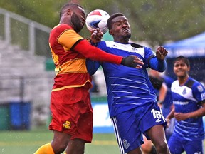 FC Edmonton Tomi Ameobi (18) and Fort Lauderdale Strikers Gale Agbossoumonde (44) go up for the header during action in NASL at Clarke Stadium in Edmonton, Sunday, July 10, 2016. Ed Kaiser/Postmedia (Standalone) Photo off FC Edmonton game for Derek Van Diest story in Monday, July 11, editions.