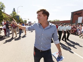 Wildrose Party leader Brian Jean marches in the Canada Day parade held in Fort McMurray on Friday, July 1, 2016. (For Edmonton Journal story by Juris Graney) Ian Kucerak / Postmedia