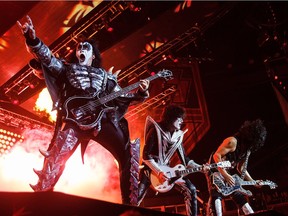 Gene Simmons (from left), Tommy Thayer and Paul Stanley of Kiss perform Tuesday, July 12, 2016, at Rexall Place in Edmonton.
