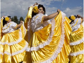 Members of the Raices Salvadorean Dance Group perform during the launch of the Heritage Festival in Edmonton's Hawrelak Park, on Tuesday July 26, 2016.
