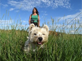 Ida Duncan and her dogs, like Magoo here, stared down the herbicide truck July 22, forcing the city staff to promise consultation on a proposed plan to use a herbicide to treat Terwillegar Park for invasive weeds.