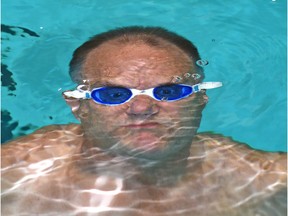 Wayne Strach, 61, submerges himself in the pool at Leduc Recreation Centre on July 13, 2016. He is training to set the world record for longest continuous swim at Okanagan Lake in August.