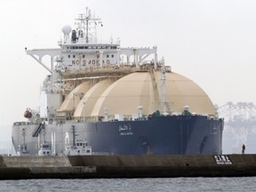 LNG tanker Umm Al Ashtan arrives at a port in Yokohama, southwest of Tokyo in October 2013. Not a single one of the dozen-plus LNG export plants once proposed in B.C. is under construction, let alone operating, whereas the U.S. is on track to become an LNG powerhouse in just a few short years, writes Gary Lamphier.