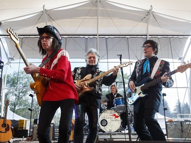 Marty Stuart, centre, performs along with Kenny Vaughan, left, and Paul Martin, right, during Interstellar Rodeo at Hawrelak Park in Edmonton, Alta., on Friday, July 22, 2016.