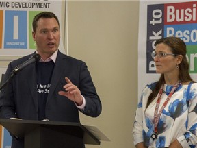 Alberta Minister of Economic Trade and Development Deron Bilous speaks Thursday during a tour with Mayor Melissa Blake through the Back to Business Resource Centre in Fort McMurray.