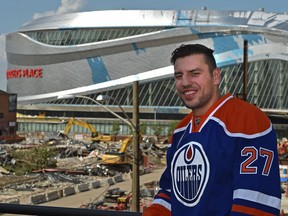 Newly acquired forward, Oiler Milan Lucic with Rogers Place in back after talking to the media in Edmonton, Friday, July 1, 2016. Ed Kaiser/Postmedia
